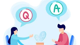 Zwei Personen an einem Tisch mit jeweils Sprechblasen über dem Kopf "Q" und "A"